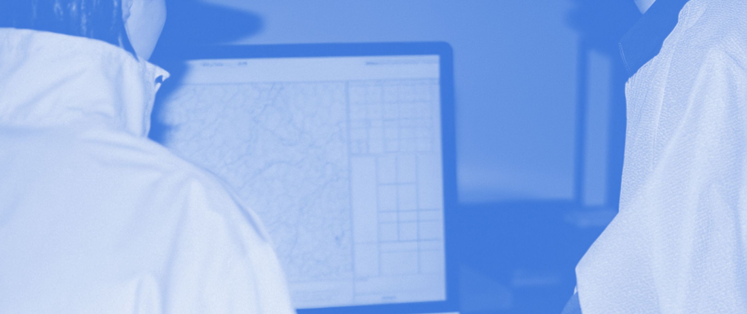 Emergency responders evaluating flood maps in an urban flooding event.